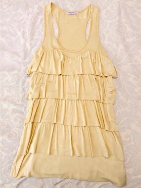 in search of!!! Aritzia frill ruffled tank top